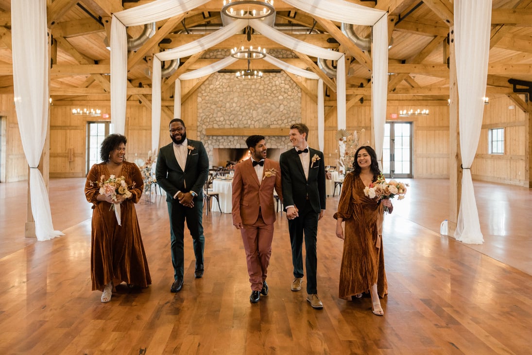 Newlywed Couple with Friends at the Wedding Hall